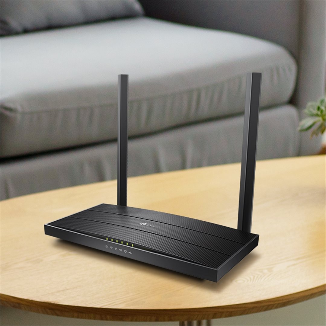 ADSL router TP-Link Archer VR400 na stole